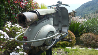 Illustration for article titled Insane Cannon Equipped Vespa Heads To Auction